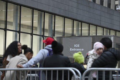 people assembled outside building exterior